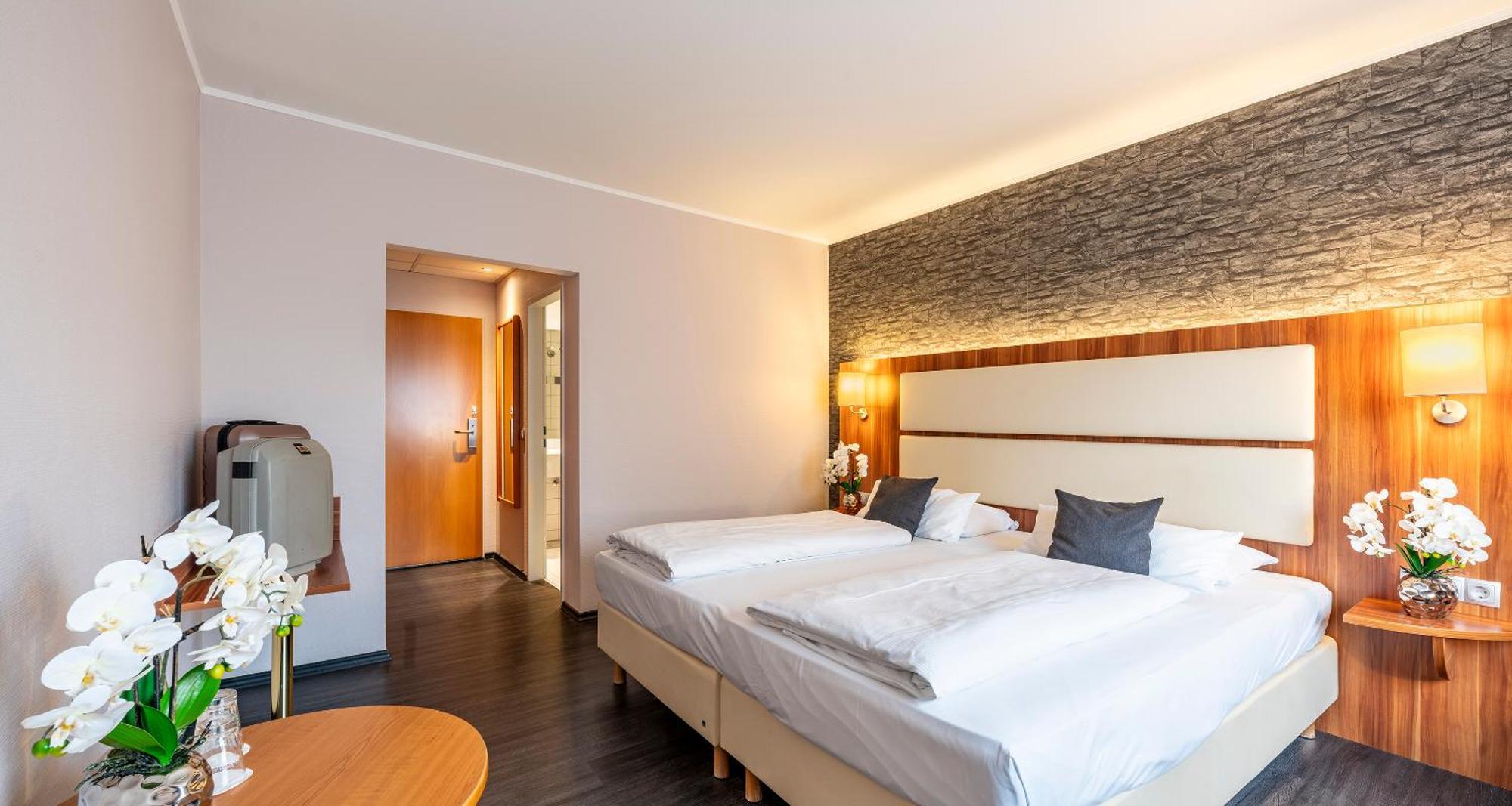 Standard Zimmer mit Kingsize-Bett